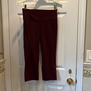 Lululemon cropped flare maroon leggings.